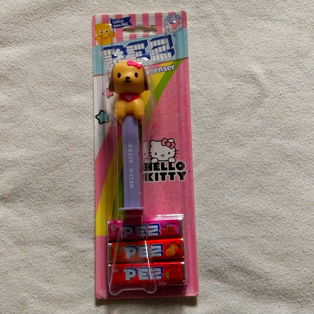PEZ Dispenser w/candy Hello Kitty "puppy" New